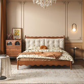 Vintage solid wood master bed featuring an elegant upholstered headboard for classic bedroom style
